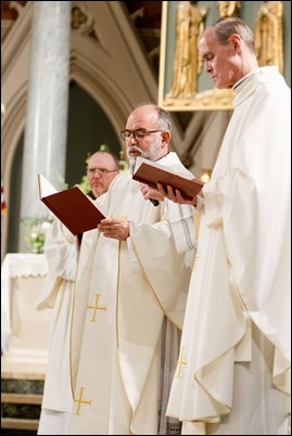 Ordination of Transitional Deacons Joseph Almeida, Maciej Kazimierz Araszkiewicz, Corey Bassett-Tirrell, Marcos Enrique, Timothy Paul Hynes, Przemyslaw Kasprzak, Brother John Edward Koelle OFM Cap., Brian Peter O’Hanlon, Mark Teodor Olejnik, Francis Huy Duc Pham, William Henry Robinson, Carignan Langlois Rouse, Victor Luna Vitug II, and James Paul Wargovich at Immaculate Conception Church in Lowell, April 14, 2018. Pilot photo/ Gregory L. Tracy 