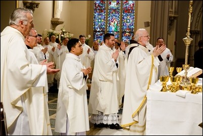 Ordination of Transitional Deacons Joseph Almeida, Maciej Kazimierz Araszkiewicz, Corey Bassett-Tirrell, Marcos Enrique, Timothy Paul Hynes, Przemyslaw Kasprzak, Brother John Edward Koelle OFM Cap., Brian Peter O’Hanlon, Mark Teodor Olejnik, Francis Huy Duc Pham, William Henry Robinson, Carignan Langlois Rouse, Victor Luna Vitug II, and James Paul Wargovich at Immaculate Conception Church in Lowell, April 14, 2018. Pilot photo/ Gregory L. Tracy 