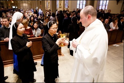 Ordination of Transitional Deacons Joseph Almeida, Maciej Kazimierz Araszkiewicz, Corey Bassett-Tirrell, Marcos Enrique, Timothy Paul Hynes, Przemyslaw Kasprzak, Brother John Edward Koelle OFM Cap., Brian Peter O’Hanlon, Mark Teodor Olejnik, Francis Huy Duc Pham, William Henry Robinson, Carignan Langlois Rouse, Victor Luna Vitug II, and James Paul Wargovich at Immaculate Conception Church in Lowell, April 14, 2018. Pilot photo/ Gregory L. Tracy 