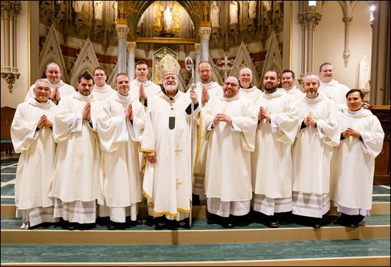 Ordination of Transitional Deacons Joseph Almeida, Maciej Kazimierz Araszkiewicz, Corey Bassett-Tirrell, Marcos Enrique, Timothy Paul Hynes, Przemyslaw Kasprzak, Brother John Edward Koelle OFM Cap., Brian Peter O’Hanlon, Mark Teodor Olejnik, Francis Huy Duc Pham, William Henry Robinson, Carignan Langlois Rouse, Victor Luna Vitug II, and James Paul Wargovich at Immaculate Conception Church in Lowell, April 14, 2018. Pilot photo/ Gregory L. Tracy 