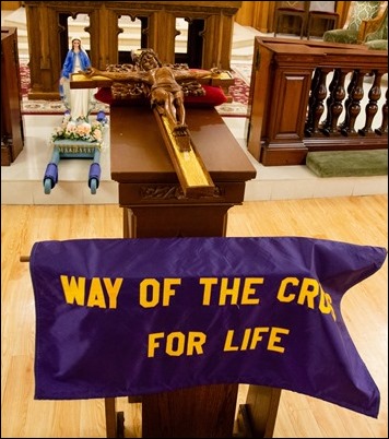 The Way of the Cross for Life visits the Cathedral of the Holy Cross on Good Friday, March 31, 2018. Pilot photo/ Mark Labbe 