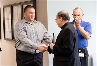 Farewell gathering of Frank Mendez, Dan Nisby and Msgr. William Fay at the Pastoral Center, June 22, 2018. Pilot photo/ Gregory L. Tracy