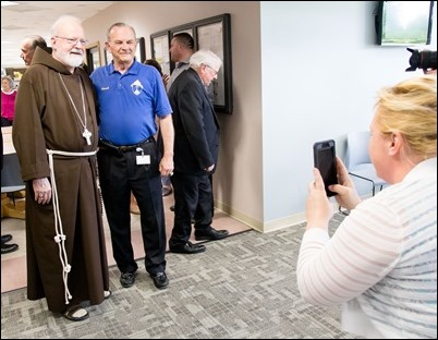 Farewell gathering of Frank Mendez, Dan Nisby and Msgr. William Fay at the Pastoral Center, June 22, 2018. Pilot photo/ Gregory L. Tracy