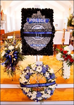 Cardinal Sean P. O’Malley celebrates the Rite of Reception for fallen Weymouth Police officer Sgt. Michael Chesna at St. Mary Church in Hanover, July 19, 2018. Photo by Gregory L. Tracy, The Pilot