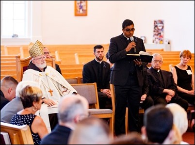 Cardinal Sean P. O’Malley celebrates the Rite of Reception for fallen Weymouth Police officer Sgt. Michael Chesna at St. Mary Church in Hanover, July 19, 2018. Photo by Gregory L. Tracy, The Pilot