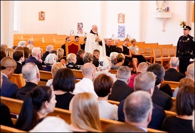 Cardinal Sean P. O’Malley celebrates the Rite of Reception for fallen Weymouth Police officer Sgt. Michael Chesna at St. Mary Church in Hanover, July 19, 2018. Photo by Gregory L. Tracy, The Pilot