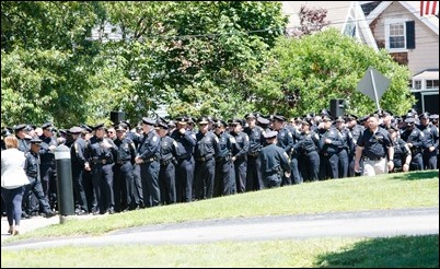 Cardinal Sean P. O’Malley celebrates the Rite of Reception for fallen Weymouth Police officer Sgt. Michael Chesna at St. Mary Church in Hanover, July 19, 2018. Photo by Gregory L. Tracy, The Pilot