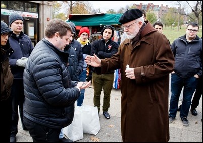 Cardinal O’Malley gives his blessing to seminarians from St. John Seminary as they prepare to distribute food and Miraculous Medals to the homeless and needy on BostonCommon as part of the Fratello initiative, marking World Day of the Poor, Nov. 18, 2018. Pilot photo/ Gregory L. Tracy 