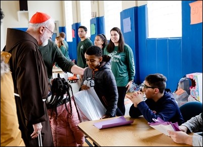 Cardinal Sean O’Malley visits Catholic Charities’ Teen Center at St. Peter’s in Dorchester, Dec. 24, 2018.
Pilot photo/ Gregory L. Tracy 