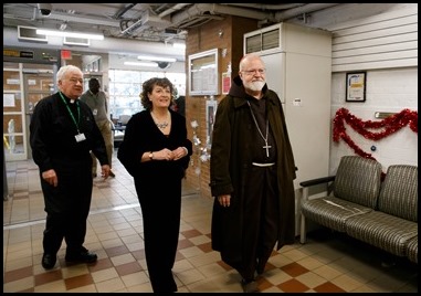 Cardinal Sean P. O’Malley serves Christmas Eve lunch at Pine Street Inn in Boston, Dec. 24, 2019.
Pilot photo/ Gregory L. Tracy