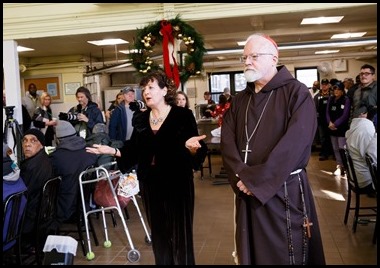 Cardinal Sean P. O’Malley serves Christmas Eve lunch at Pine Street Inn in Boston, Dec. 24, 2019.
Pilot photo/ Gregory L. Tracy