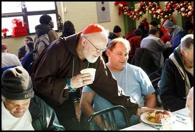 Cardinal Sean P. O’Malley serves Christmas Eve lunch at Pine Street Inn in Boston, Dec. 24, 2019.
Pilot photo/ Gregory L. Tracy