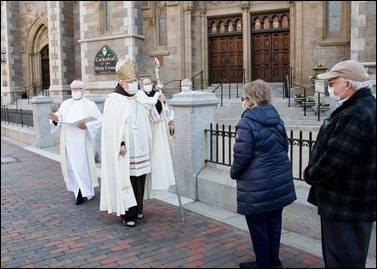 Cardinal Sean P. O’Malley celebrates the Rite of Final Commendation for retired Boston Auxiliary Bishop Emilio S. Allue outside the Cathedral of the Holy Cross April 29, 2020. Bishop Allue died April 26 of complications from COVID-19.
Pilot photo/ Gregory L. Tracy