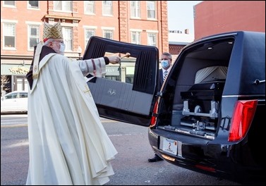 Cardinal Sean P. O’Malley celebrates the Rite of Final Commendation for retired Boston Auxiliary Bishop Emilio S. Allue outside the Cathedral of the Holy Cross April 29, 2020. Bishop Allue died April 26 of complications from COVID-19.
Pilot photo/ Gregory L. Tracy