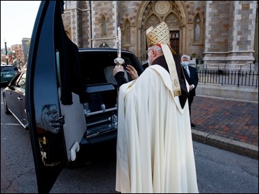 Cardinal Sean P. O’Malley celebrates the Rite of Final Commendation for retired Boston Auxiliary Bishop Emilio S. Allue outside the Cathedral of the Holy Cross April 29, 2020. Bishop Allue died April 26 of complications from COVID-19.
Pilot photo/ Gregory L. Tracy