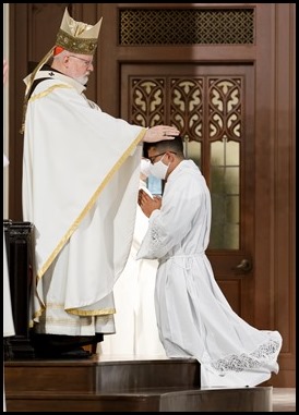 Cardinal Sean P. O’Malley ordains Transitional Deacons Fernando Ayala, David Anthony Campo, Brother Francis Godkin FPO, Robert LeBlanc Jr., Leonardo Moreira, Kevin Pleitez, Steven Restrepo, Alwin Chinnappan and Valanarasu Williamraj at the Cathedral of the Holy Cross on Oct. 24, 2020.
Pilot photo/ Gregory L. Tracy