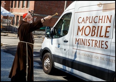 Cardinal Sean O’Malley blesses the van used by Capuchin Mobile Ministries’ outreach to the homeless at San Lorenzo Friary in Jamaica Plain March 27, 2021.
Pilot photo/ Gregory L. Tracy 