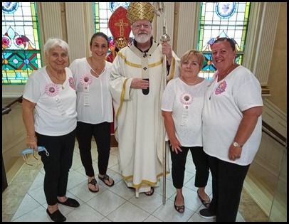 St. Lucy Society members with the Cardinal