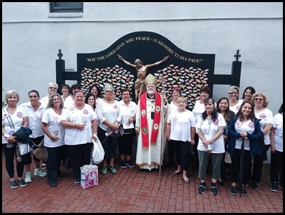 St. Lucy Society members and the Cardinal