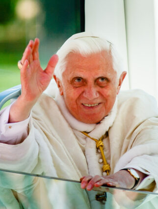 Pope Benedict XVI waives fduring his 2008 visit to Washington, D.C. 
Pilot photoby Gregory L. Tracy